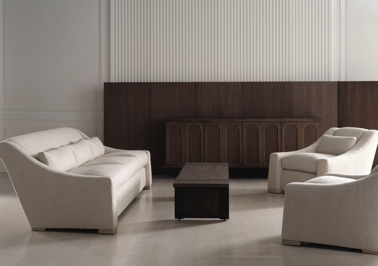 The Thomas Pheasant Collection featuring the Venice Sofa - Loose Seat, the Venice Club Chair - Loose Seat, the Rome Credenza, and the Prato Cocktail Table. Visit the link in our bio for more information. #ThingsChosenWell #ThomasPheasant